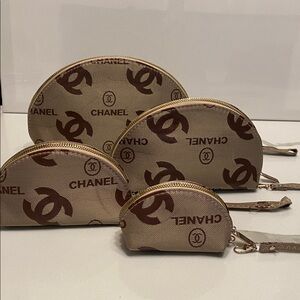 ✅ PRICE IS FIRM ✅ Fashion Brown Logo Cosmetic Bag. 4pcs for the price of 1.